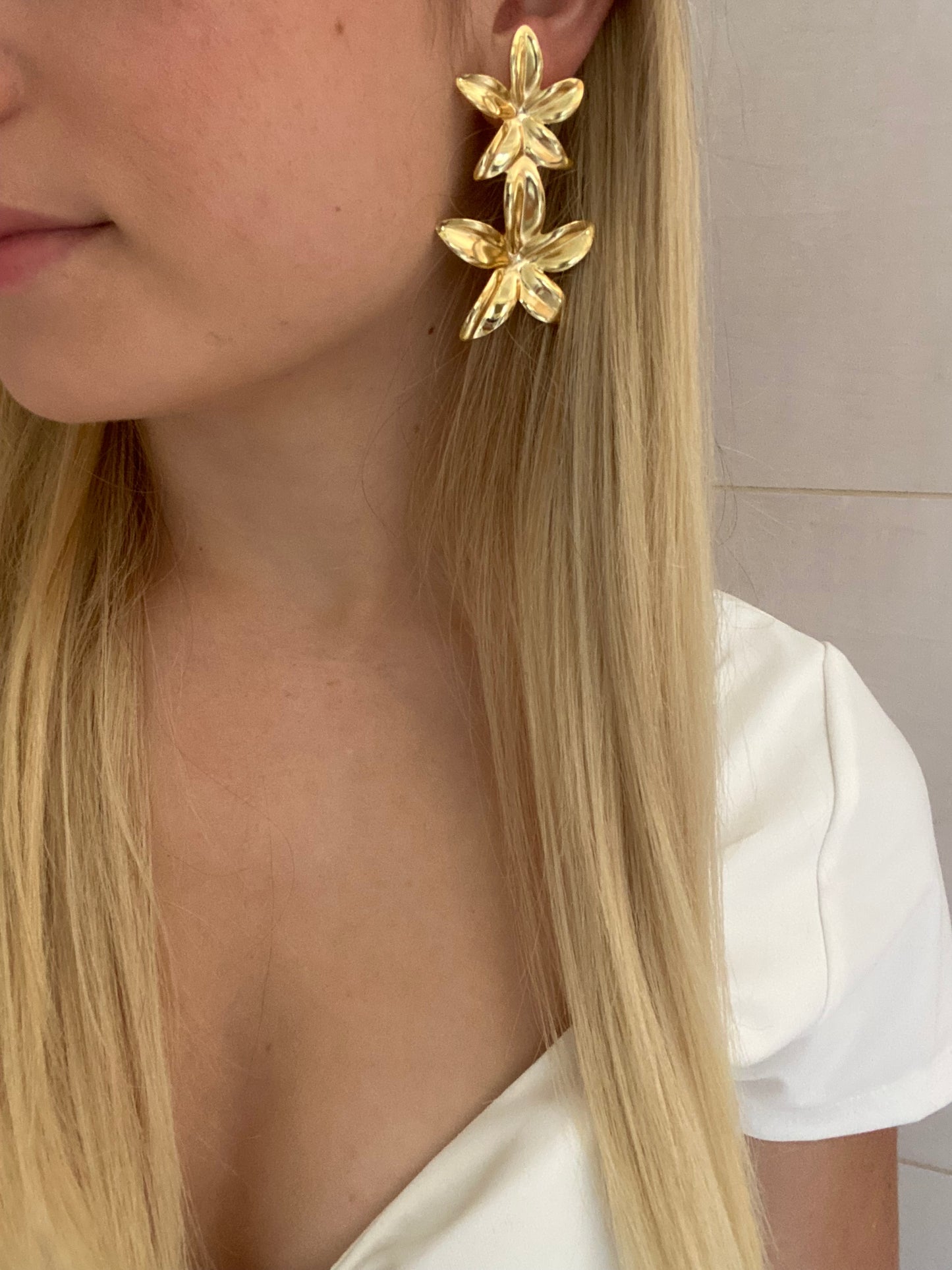 Boucle d'oreille double fleur